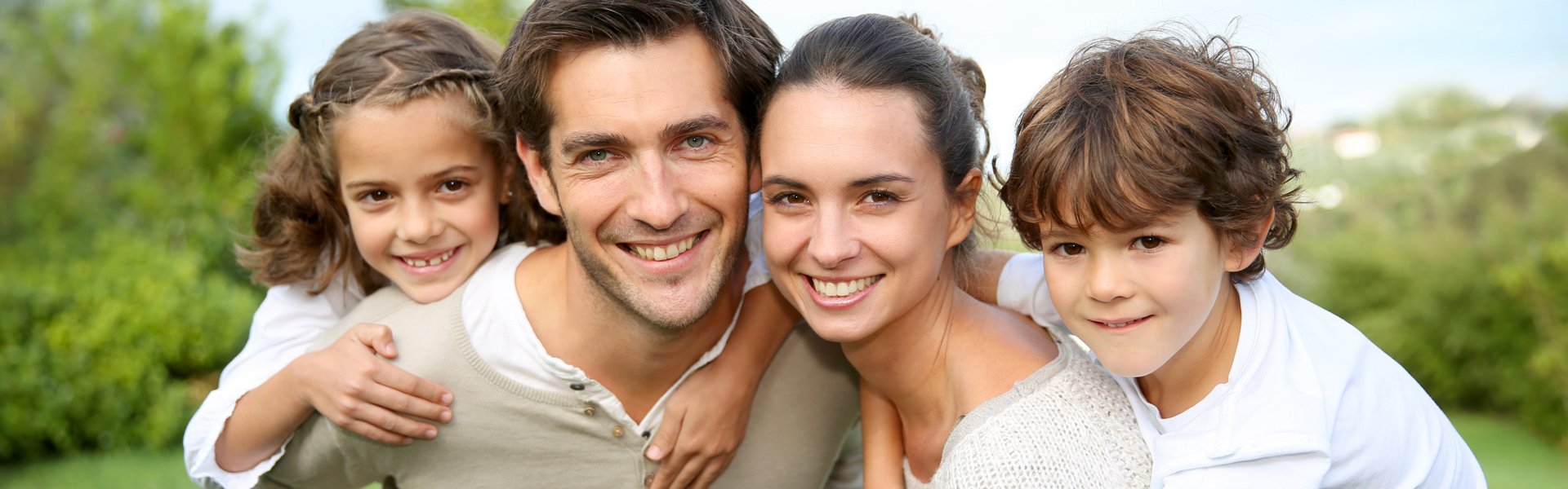 A man and woman smile for the camera.